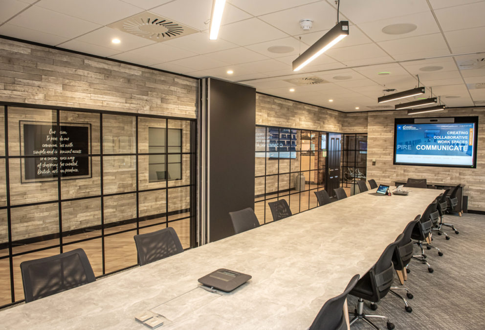 Milk&More Boardroom with tracking camera and acoustic panels